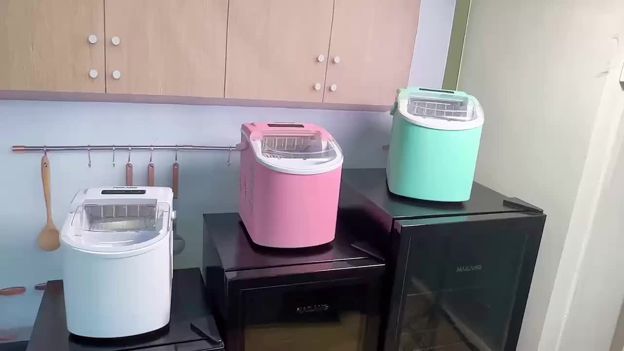 Desktop Ice Maker With A Handle Produces 26 Pounds Of Ice In 24 Hours And Can Make 9 Ice Cubes In 6 Minutes.